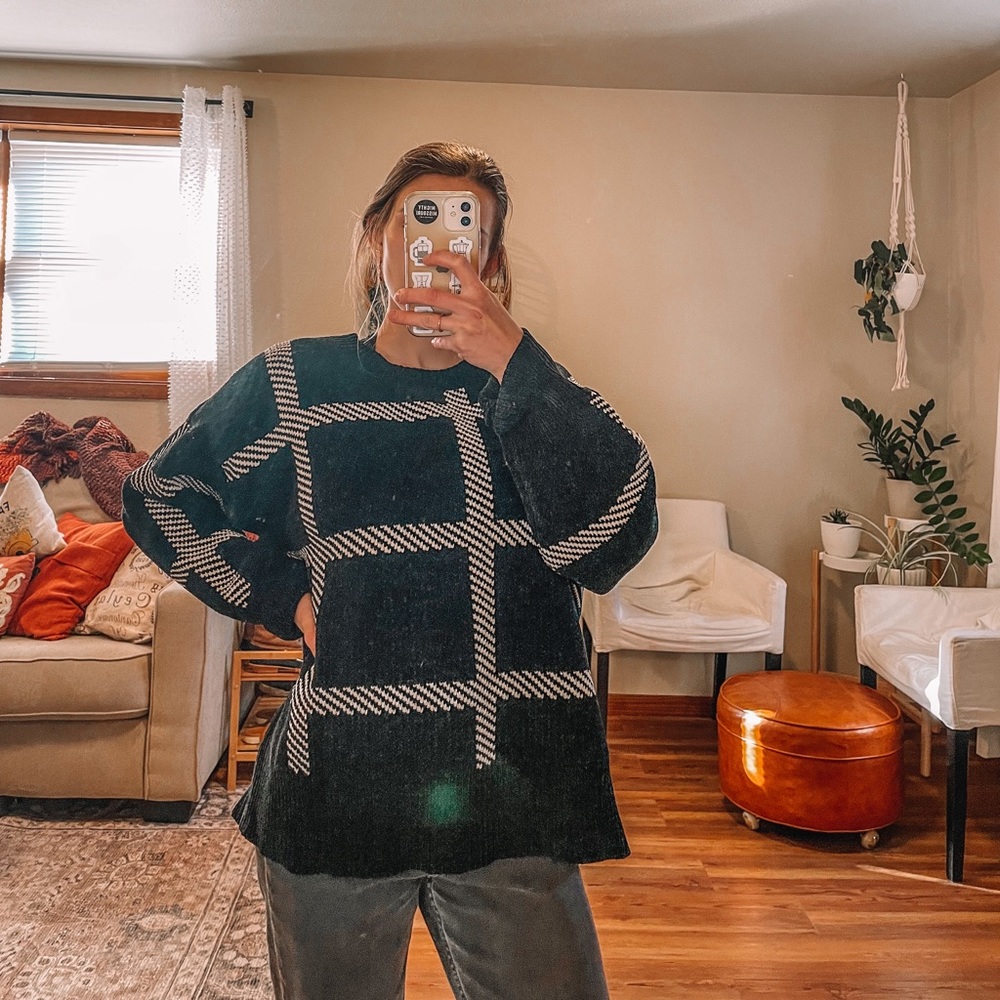 - Vici black and white checkered chunky knit sweater